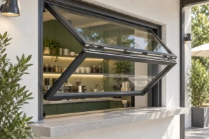 Gray vertical folding service window partly open above a stone counter in an illustrative application scene