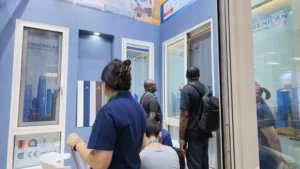 Window displays and a product discussion inside the Rogenilan booth in April 2026